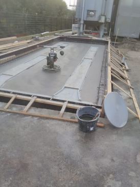 Storten en vlinderen van beton vloer!